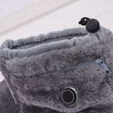 Soft grey fabric, control button, zipper and adjustable cuff